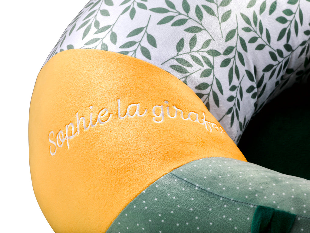 A closeup of the soft frabric and "Sophie la girafe" stitching on the Sophie baby seat