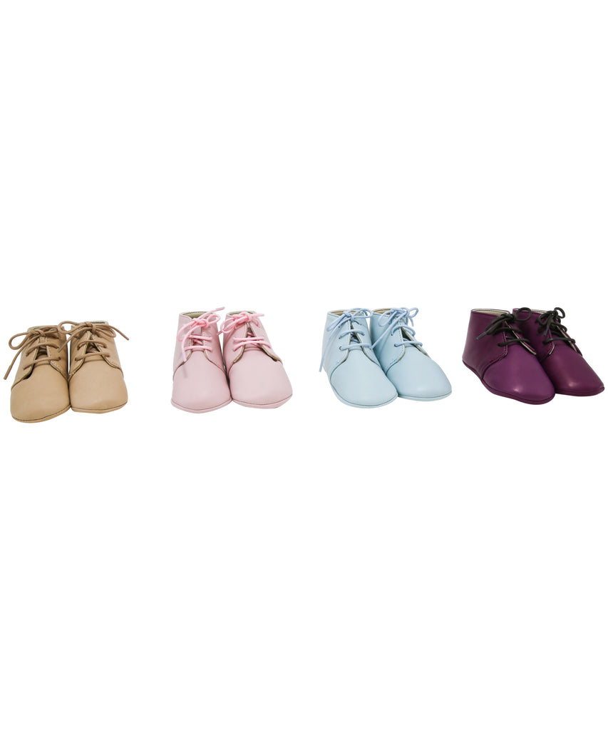 Four pairs of leather booties for toddlers in beige, pink, blue, and purple from calisson little royals