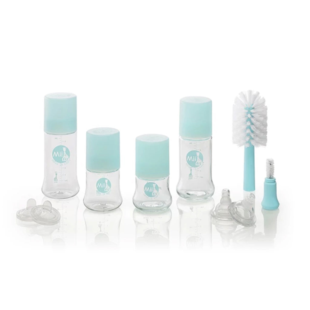 Mii sophie the giraffe product line showing baby bottles, bottle nipples, and cleaning brushes